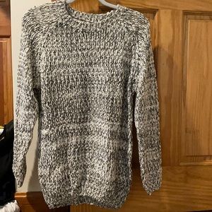 Black and white sweater . Size medium